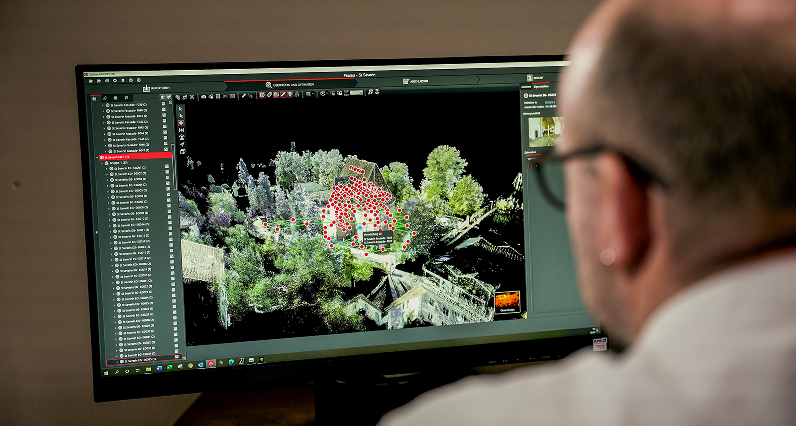 Thomas Grassl of Architecture firm, PB Grassl, reviews data of ancient St Severin church on computer with Leica Cyclone REGISTER 360.